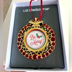 Liz Claiborne ornament. Great for photo. Gold finish with red stones.